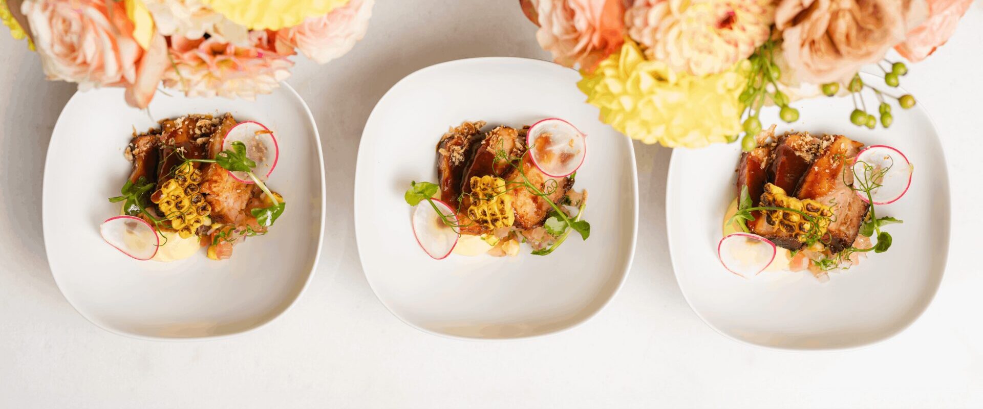 Barbecued pork belly, sweet corn cream, sweet corn and tomato salsa wedding menu